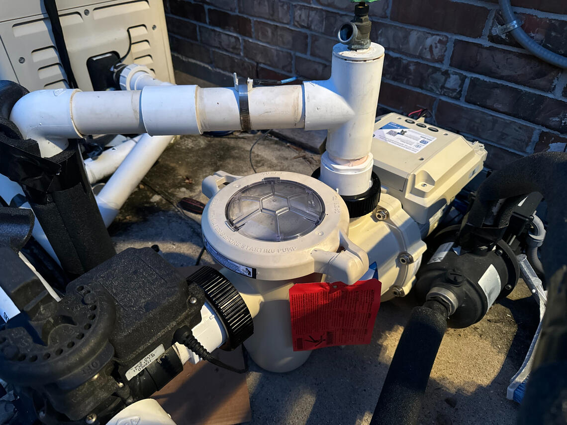 After picture of a professional installation of a Pentair Intelliflo 3 variable speed pump install Fulshear, TX, by Drew Pools.