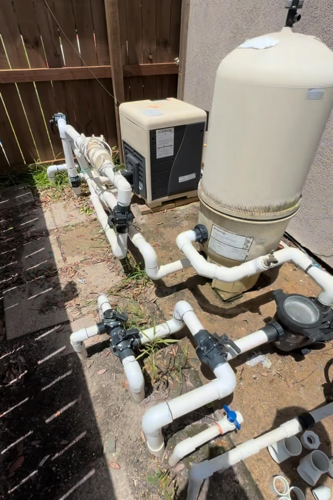 Before AquaStar filter install pool equipment pad snapshot Pearland Texas by Drew Pools. Before picture of a residential equipment pad in Pearland Texas by Drew Pools.