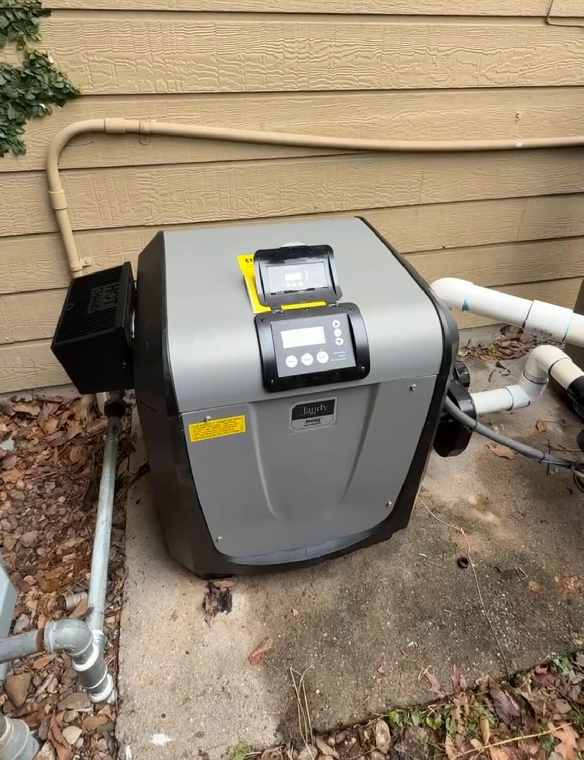 New Jandy JXIQ gas pool heater installed in Houston, Texas, by Drew Pools. Bluetooth gas fired pool heater Jandy JXIQ in Houston, TX, professionally installed by Drew Pools.